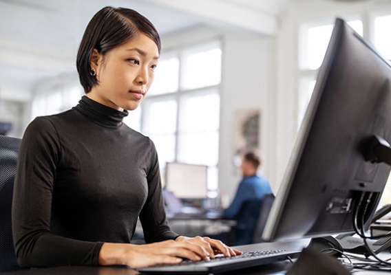 Person working at computer.